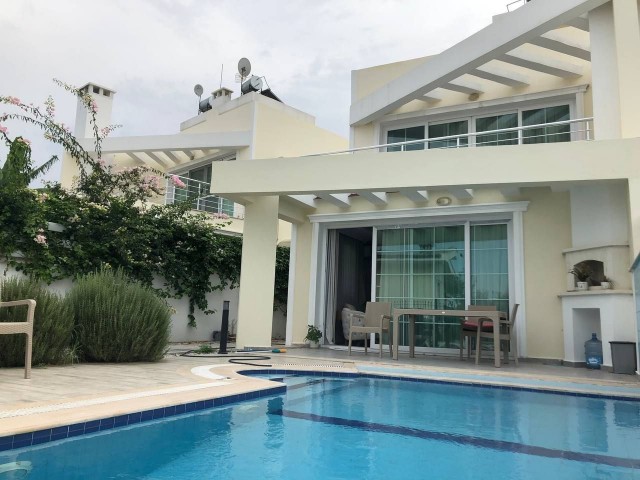 For sale, a 3+1 twin villa in Kyrenia - Alsancak. Fully furnished, with appliances, pool, fireplace, 100 meters to the English school. We speak Turkish, Russian, and English.