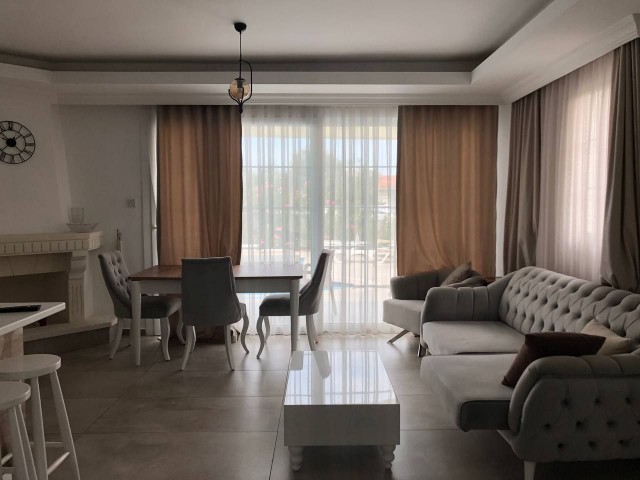 For rent in Kyrenia - Alsancak, a 3+1 "twin" villa with a pool, furnished, and with appliances. Just 100 meters from the English school.