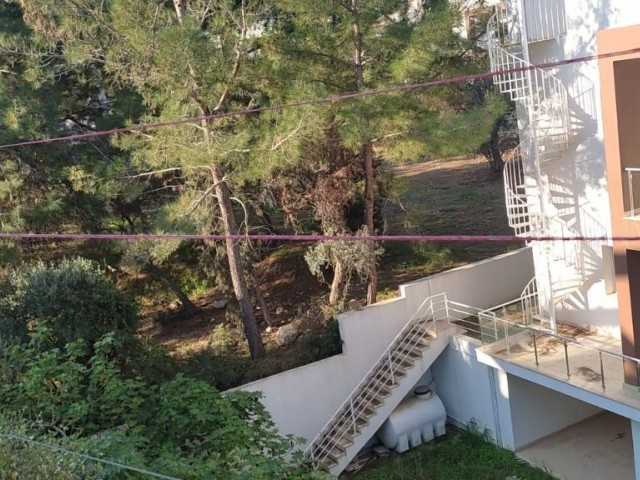 2+1 flat for sale in Girne Zeytinlk, offering a peaceful life amid greenery