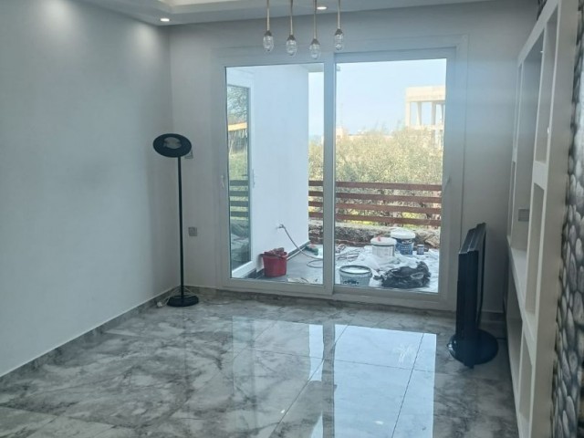 Ground floor 2+1 flat with garden for sale in Kyrenia Lapta