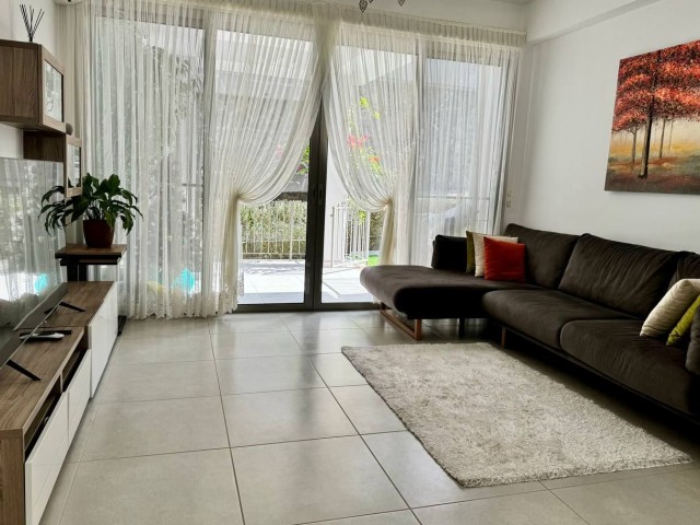 Kyrenia – Alsancak. 2+1 Wohnung mit Garten zum Verkauf im Luxuskomplex Milos Park