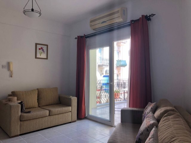 Furnished 2+1 flat with swimming pool for sale in Kyrenia-Alsancak. Discounted price.