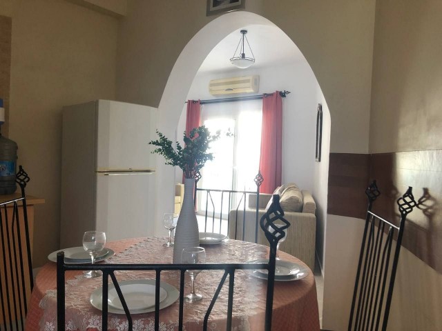 Furnished 2+1 flat with swimming pool for sale in Kyrenia-Alsancak. Discounted price.