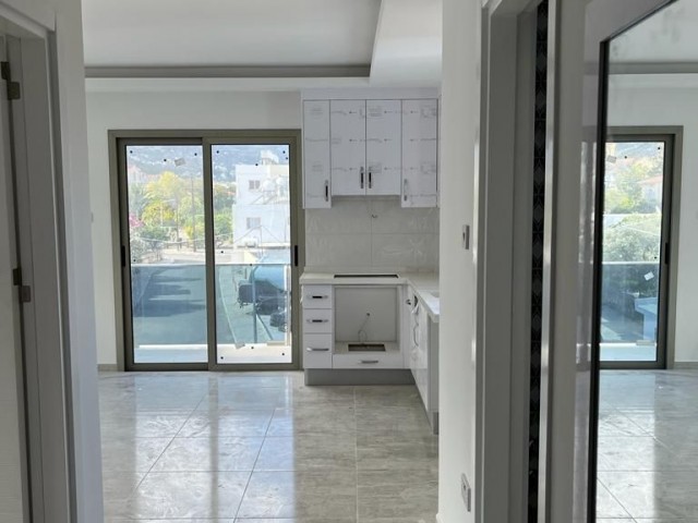 Kyrenia - Alsancak, new 2+1 flat for sale with sea and mountain views.