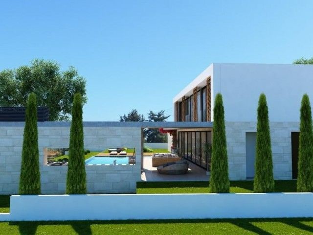 Недавно построенные виллы 3+1 с большими садами на продажу в Кирении Зейтинлк.