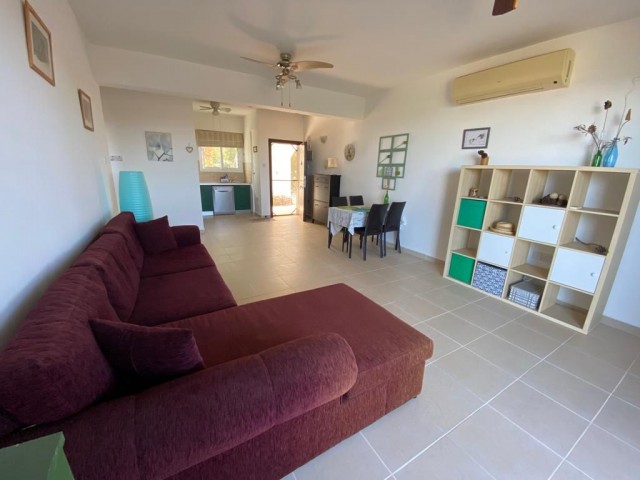 FURNISHED 2 BEDROOM GARDEN APARTMENT WITH LOVELY SEA AND MOUNTAIN VIEWS – FULL INDIVIDUAL TITLE DEED IN OWNERS NAME