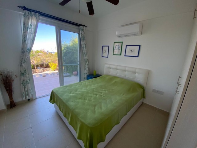 FURNISHED 2 BEDROOM GARDEN APARTMENT WITH LOVELY SEA AND MOUNTAIN VIEWS – FULL INDIVIDUAL TITLE DEED IN OWNERS NAME