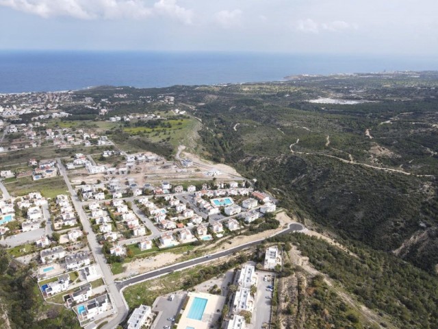 For sale, a dec80m2 Plot equivalent to 100%, with a large sea view, in one of the fast-developing areas at Çatalkoy ** 