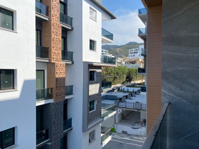 A 1-Bedroom Apartment with a Newly Finished Office Permit, Mountain and Sea Views, Located on a Site with a Pool in the Center of Kyrenia ** 