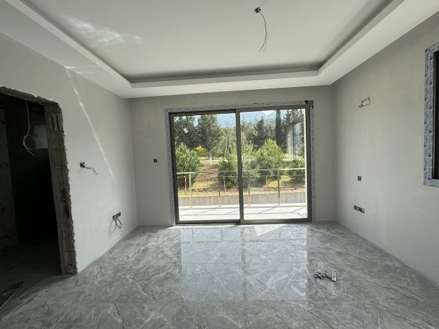 We have a Spacious 2-Bedroom Apartment in Kyrenia Edremit With A Roof Terrace And A Garden, a 5-Minu