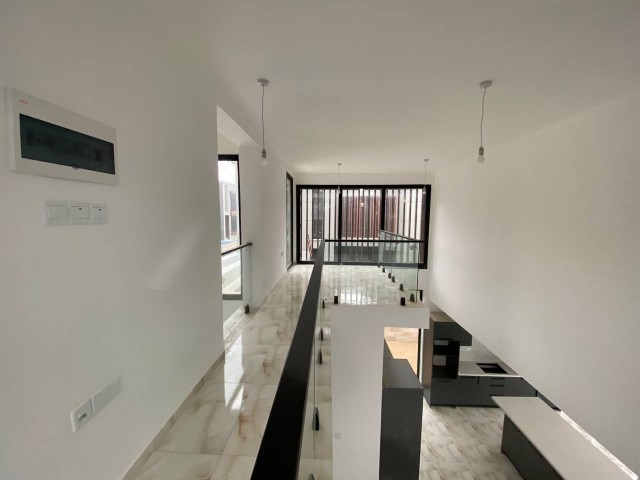 Ready to Move 4 Bedrooms 25M2 Terrace Pool, Central Heating and Smart Sound System Feature in Alsancak- Kyrenia