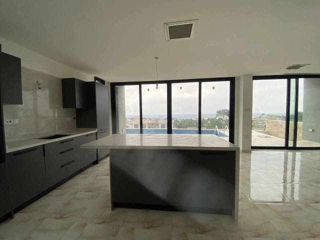 Ready to Move 4 Bedrooms 25M2 Terrace Pool, Central Heating and Smart Sound System Feature in Alsancak- Kyrenia