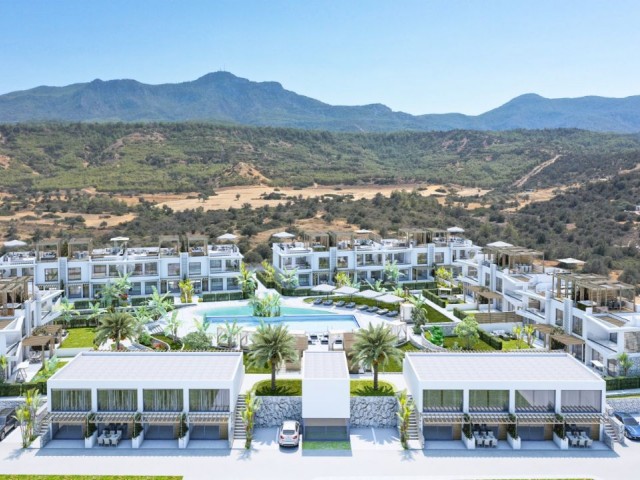 Kyrenia Esentepe 2 & 3 Schlafzimmer Central Sunbed Shared Pool mit Sonnenliegen Back Mountain Front Open to the Sea Unser neues Projekt