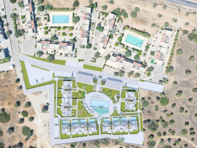 Kyrenia Esentepe 2 & 3 Schlafzimmer Central Sunbed Shared Pool mit Sonnenliegen Back Mountain Front Open to the Sea Unser neues Projekt