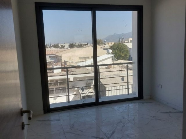 Our Newly Completed Project With Office Leave In Girne Karaoğlanoğlu, 2 Bedrooms, Back Row, Mountain View, Bottom of the Building, Consisting of Rows of Shops.