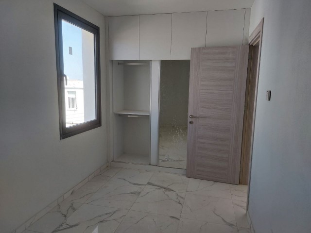 Our Newly Completed Project With Office Leave In Girne Karaoğlanoğlu, 2 Bedrooms, Back Row, Mountain View, Bottom of the Building, Consisting of Rows of Shops.