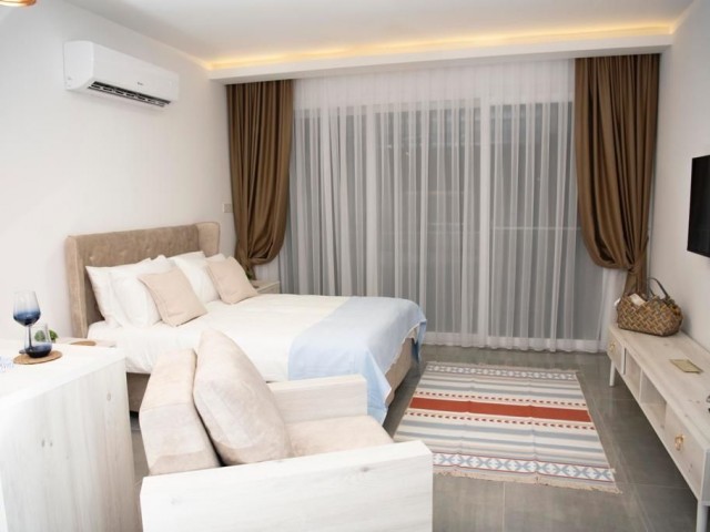 Studio flat for sale in İskele Courtyard site with full sea view, ALL TAXES PAID