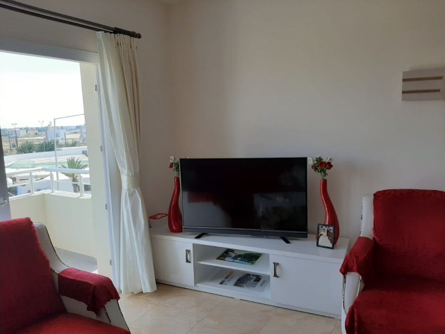 FULLY FURNISHED WITH A SHARED POOL IN FAMAGUSTA YENIBOGAZ 2. 2 + 1 APARTMENT FOR SALE ON THE FLOOR ** 