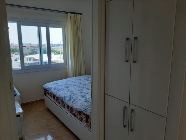 FULLY FURNISHED WITH A SHARED POOL IN FAMAGUSTA YENIBOGAZ 2. 2 + 1 APARTMENT FOR SALE ON THE FLOOR ** 