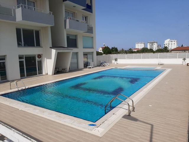 FULLY FURNISHED WITH A SHARED POOL IN FAMAGUSTA YENIBOGAZ 2. 2 + 1 APARTMENT FOR SALE ON THE FLOOR ** 