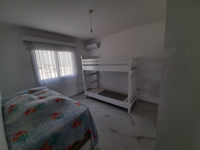 FURNISHED 2+1 FLAT WITH PARKING PARKING ON THE 1ST FLOOR FOR SALE IN İSKELE LONG BEACH AREA