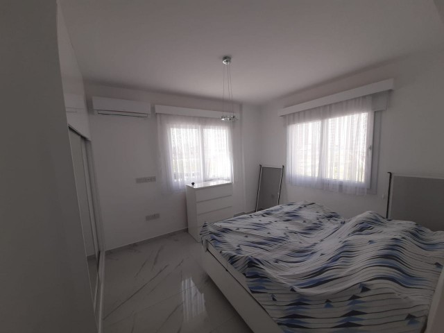 FURNISHED 2+1 FLAT WITH PARKING PARKING ON THE 1ST FLOOR FOR SALE IN İSKELE LONG BEACH AREA