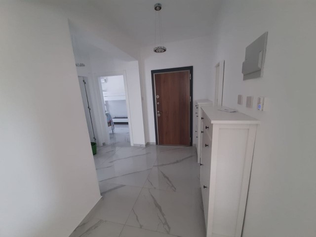 FURNISHED 2+1 FLAT WITH PARKING PARKING ON THE 1ST FLOOR FOR SALE IN İSKELE LONG BEACH AREA