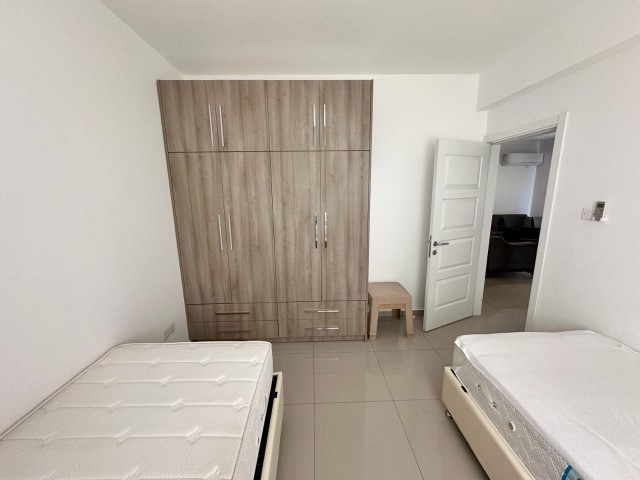 AVAILABLE 2+1 FLAT WITH COMMON POOL FOR RENT IN İSKELE LONG BEACH ROYAL SUN SITE