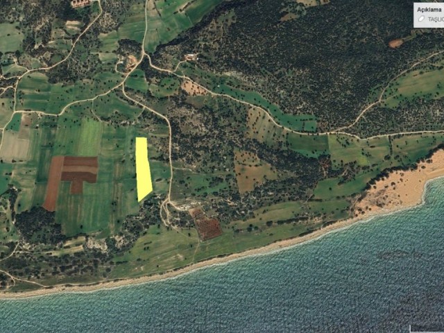 Grundstück zum Verkauf in der Gegend von İskele Taşlıca, 200 Meter vom Meer entfernt