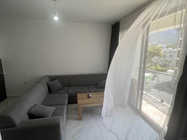 SPACIOUS 2+1 FLAT FOR RENT IN THE CENTER OF KYRENIA