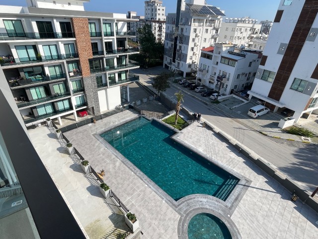 1+1 LUXURY APARTMENT FOR SALE IN A COMPLEX WITH COMMUNAL POOL IN THE CENTER OF CYPRUS GİRNE