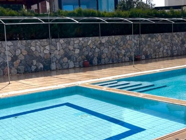 2+1 house for sale in a site with pool in Esentepe