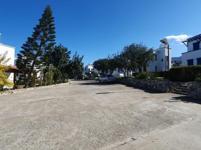 2+1 house for sale in a site with pool in Esentepe