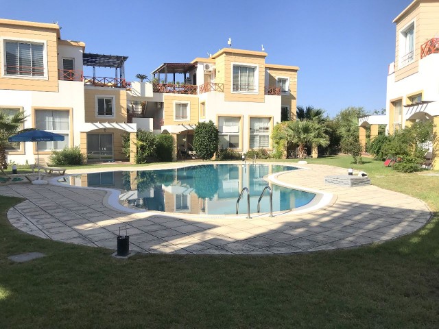 1+1 ground floor duplex apartment with garden in a well-maintained site 500m from the sea in Kyrenia Alsancak. Fully Furnished (can be converted to 2+1). 05338403555 ** 