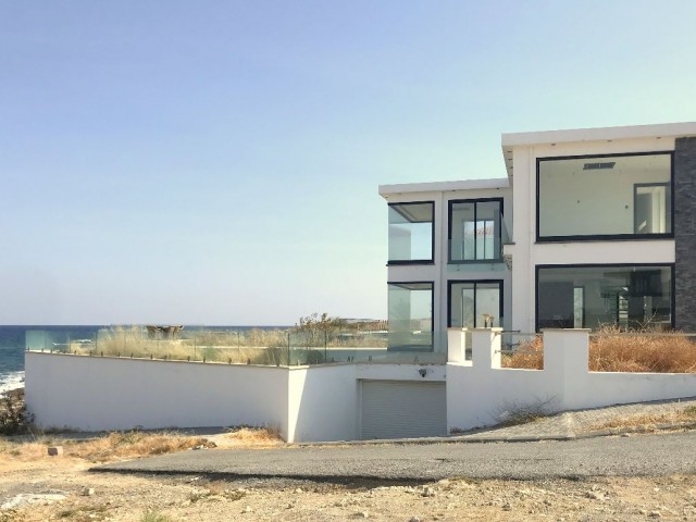 Kyrenia, Karşıyaka sea front, zero to sea modern 3 bedroom villa. Infinity pool, huge basement. 05338403555