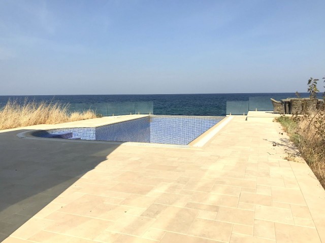 Kyrenia, Karşıyaka sea front, zero to sea modern 3 bedroom villa. Infinity pool, huge basement. 05338403555