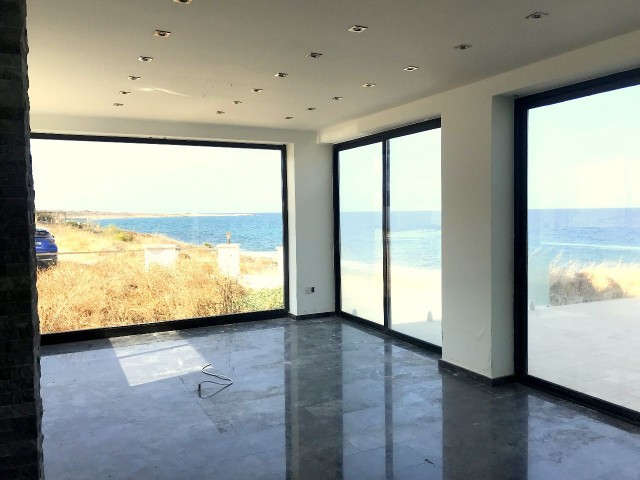 Kyrenia, Karşıyaka sea front, zero to sea modern 3 bedroom villa. Infinity pool, huge basement. 05338403555