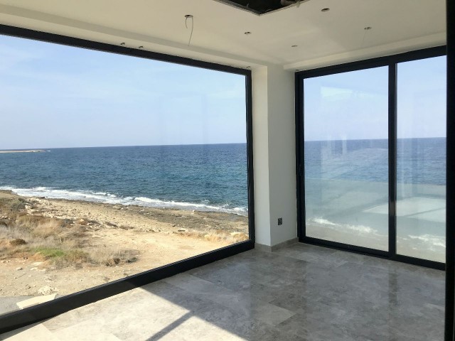 Kyrenia, Karşıyaka sea front, zero to sea modern 3 bedroom villa. Infinity pool, huge basement. 05338403555