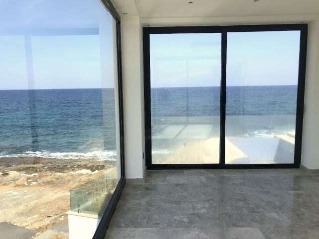 Kyrenia, Karşıyaka sea front, zero to sea modern 3 bedroom villa. Infinity pool, huge basement. 05338403555