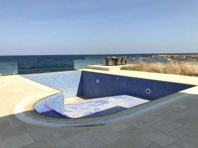 Kyrenia, Karşıyaka sea front, zero to sea modern 3 bedroom villa. Infinity pool, huge basement. 05338403555