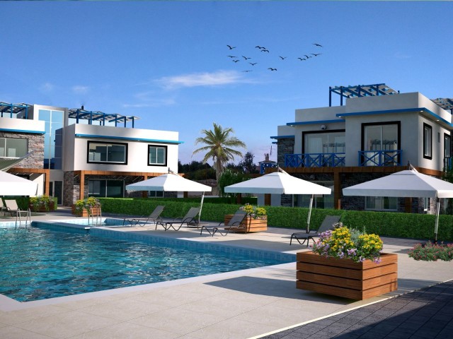 Turkish deed apartments in a complex with a pool, 300m from the sea in Karsiyaka, Girne. With ground floor or upper floor terrace options.05338403555 ** 