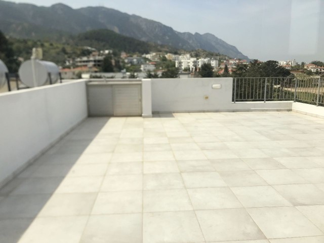 1st floor flat with terrace is for rent in a 7x24 secure site in Alsancak, Girne.05338403555 ** 