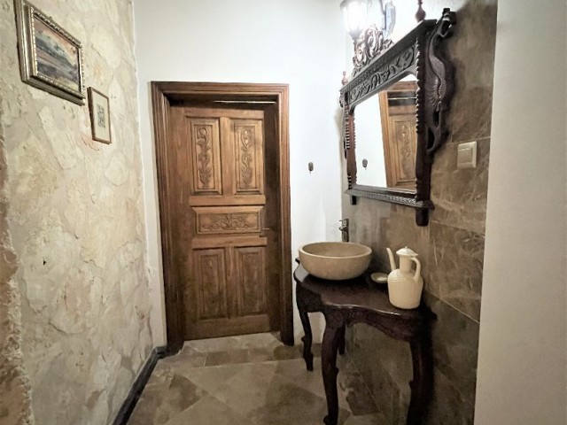 spectacular stone house is only 200 meters from the sea in Karşıyaka, Girne. Solid stone house with 4 bedrooms. It has a private swimming pool, study room and closed garage. You are welcome to the terrace of this villa for the most perfect sunset on the island.