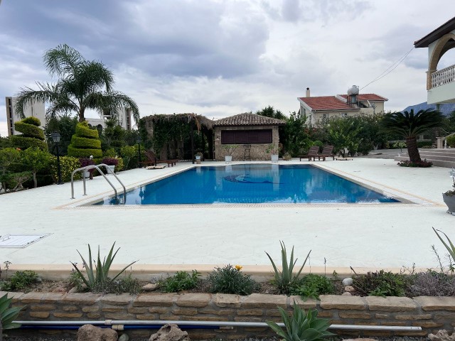 Turkish title Villa for sale in Lapta in 3144m2 land(aprox 2,5 donum of land) Gorgeous garden that makes you feel like in a botanical garden, pool bar&kitchen, water well and a lot of details need to be seen. 05338403555