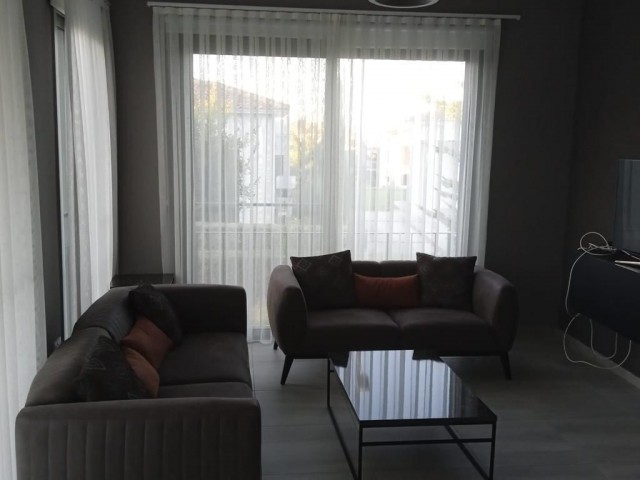 Fully furnished apartment with ground floor garden in a well-kept complex with 24x7 security in Alsancak, Kyrenia. 05338403555