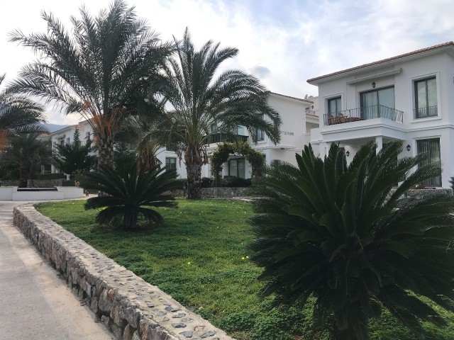 Fully furnished apartment with ground floor garden in a well-kept complex with 24x7 security in Alsancak, Kyrenia. 05338403555