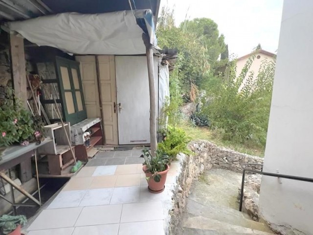 An old Cypriot house in Lapta, Kyrenia, where you will be surrounded by nature and history, and where you will enjoy sea and mountain views. The zoning rate in the area where our house is located, which has a land of 869m2, is 90%.05338403555