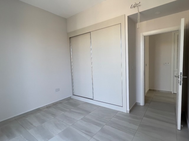 2+1 ground floor flat with garden in Kyrenia Alsancak Kıbrıs Town site with 24/7 security. 05338403555