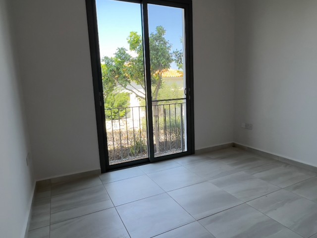 2+1 ground floor flat with garden in Kyrenia Alsancak Kıbrıs Town site with 24/7 security. 05338403555