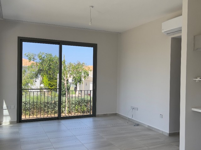 2+1 ground floor flat with garden in Kyrenia Alsancak Kıbrıs Town site with 24/7 security. 05338403555